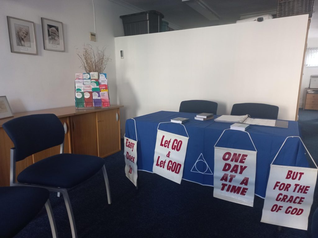 table with Al-Anon slogans